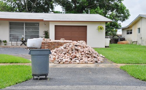 Load-based rubbish containers and cubic yard estimate